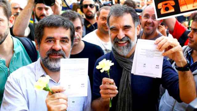 El presidente de la ANC, Jordi Cuixart, y su homologo en Òmnium Cultural, Jordi Cuixart, durante el 1-O / EFE