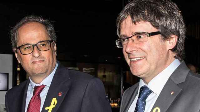 Quim Torra, nuevo presidente de la Generalitat junto a Carles Puigdemont / EFE