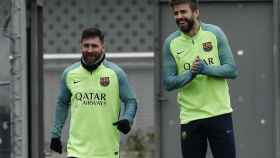 Una foto de archivo de Leo Messi y Gerard Piqué / FCB