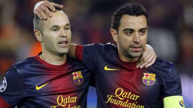 Andrés Iniesta, junto a Xavi Hernández / EFE