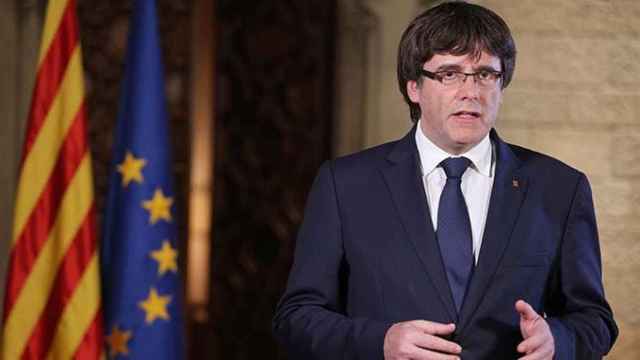 El presidente Carles Puigdemont, en el discurso televisado sobre la aplicación del artículo 155 / RUBÉN MORENO