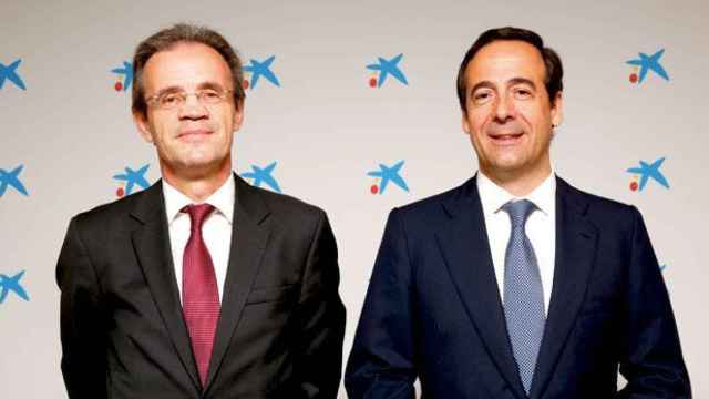 Jordi Gual, presidente de CaixaBank, y Gonzalo Gortázar, consejero delegado de la entidad en una imagen de archivo / CG