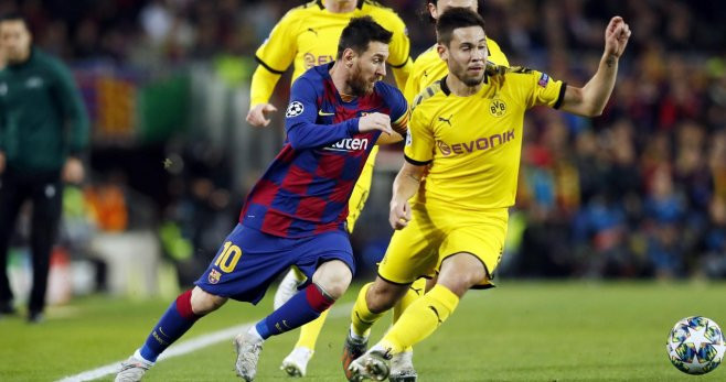 Messi luchando con Guerreiro un balón contra el Borussia Dortmund / FC Barcelona