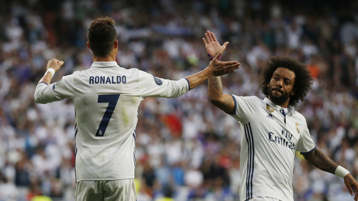 Marcelo y Cristiano Ronaldo celebran un gol del Real Madrid / EFE