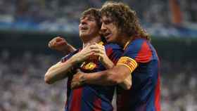 Carles Puyol, celebrando un gol junto a Leo Messi | EFE