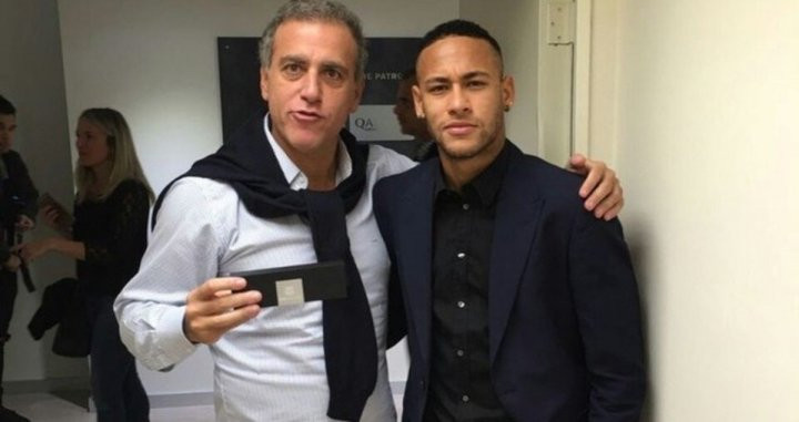 Una foto de archivo de André Cury y Neymar / EFE