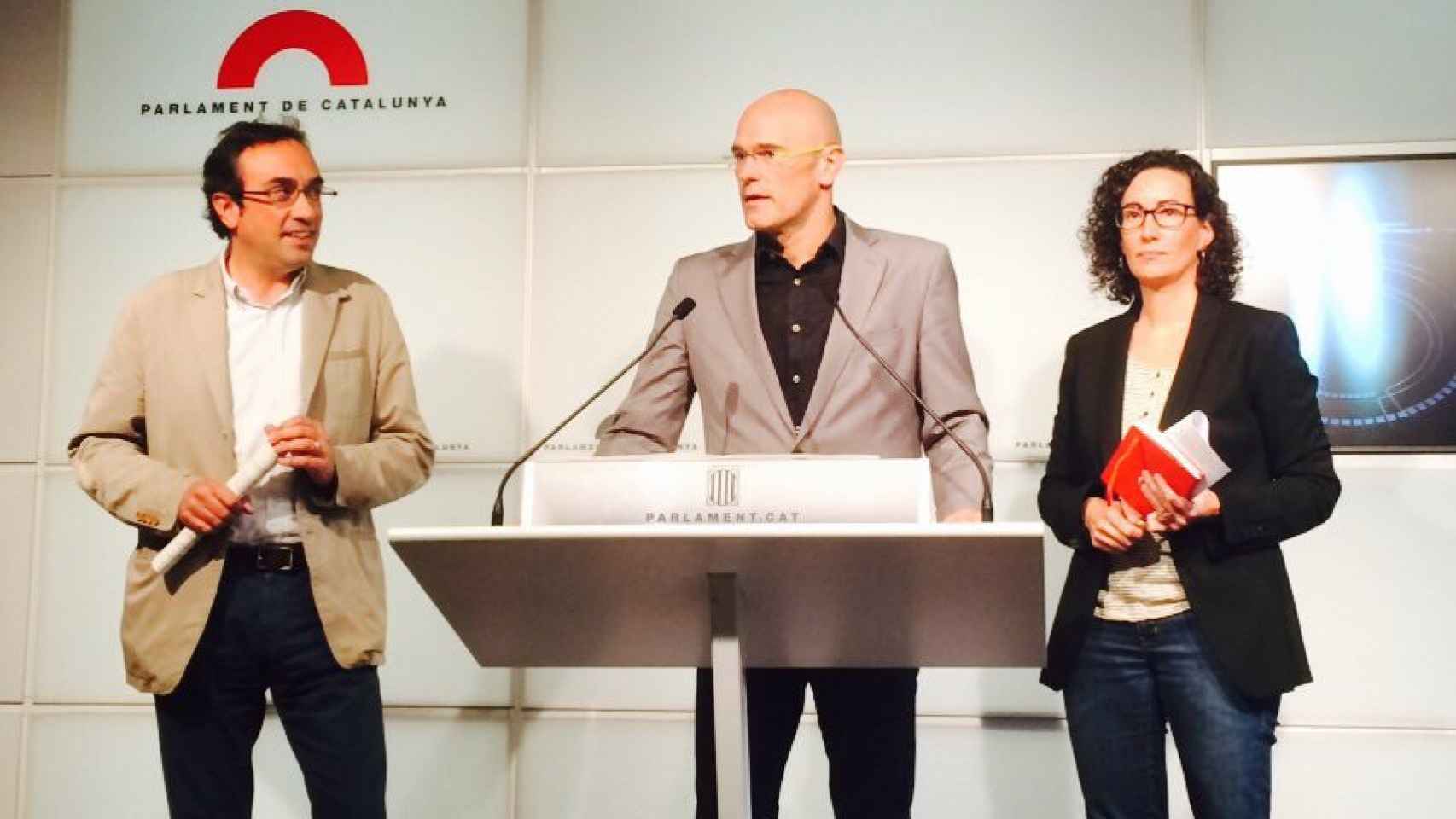 Los diputados de JxSí Josep Rull, Raül Romeva y Marta Rovira.