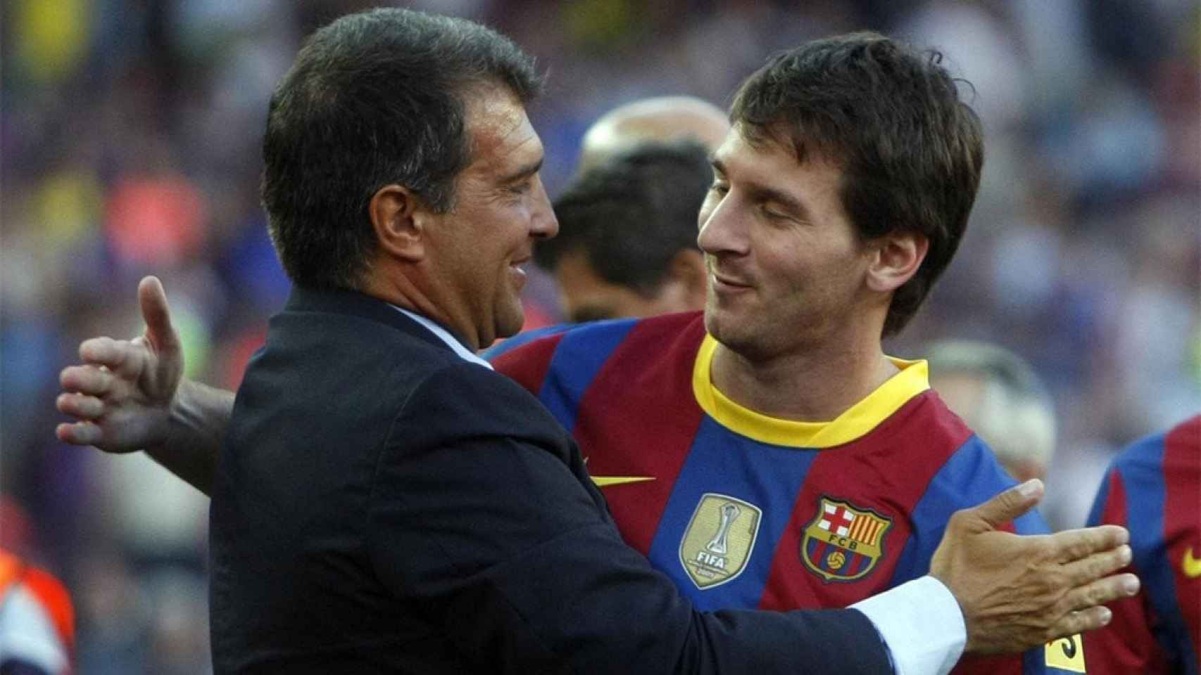 Laporta, en una imagen con Leo Messi | EFE