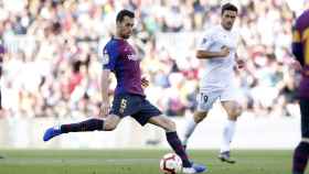 Sergio Busquets disputando el Barça - Getafe / FC Barcelona