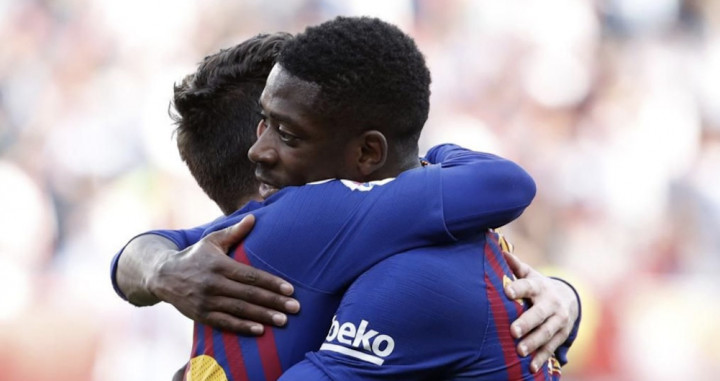 Una foto de Ousmane Dembelé y Leo Messi celebrando un gol / FCB