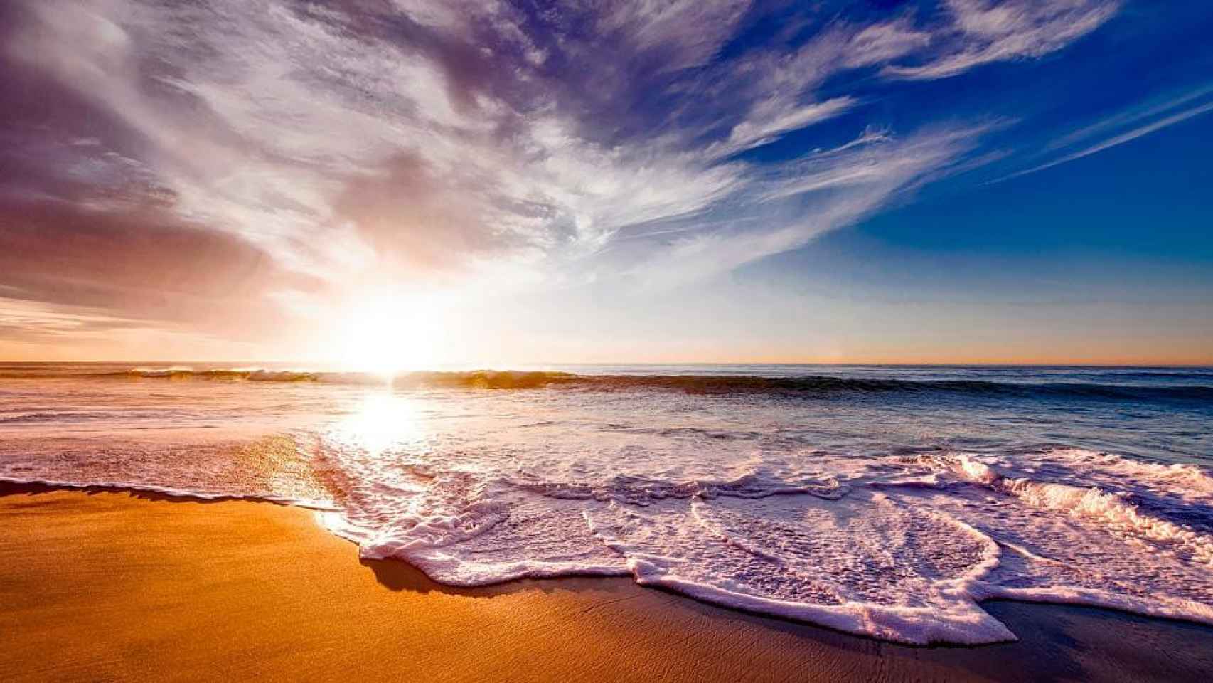 Puesta de sol en la playa / PIXABAY