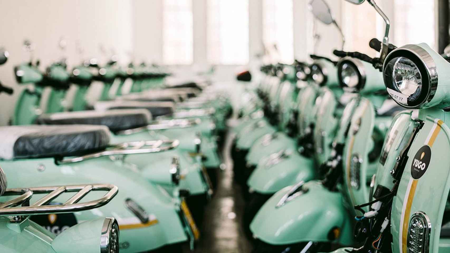 Flota de motos eléctricas de alquiler de Yego, una de las firmas de movilidad compartida / EUROPA PRESS