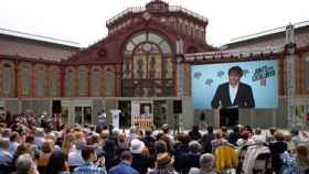 Imagen de la última aparición pública de Carles Puigdemont a través de una videoconferencia desde Bélgica en un acto de campaña de JxCat / EFE