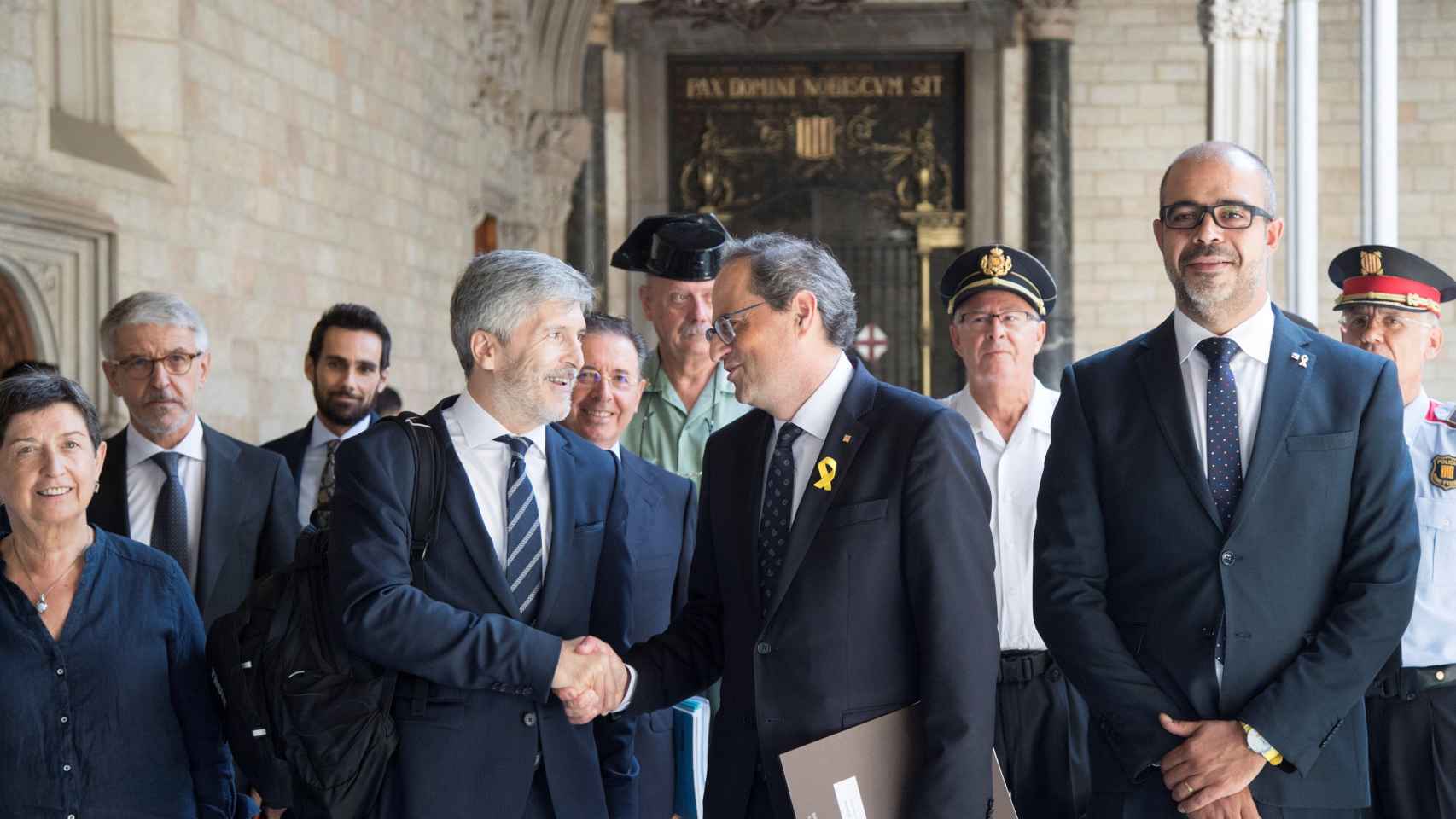 El ministro del Interior, Fernando Grande-Marlaska, junto al presidente catalán, Quim Torra, confía en los Mossos ante el 1-O