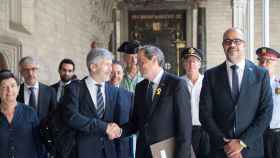 El ministro del Interior, Fernando Grande-Marlaska, junto al presidente catalán, Quim Torra, confía en los Mossos ante el 1-O