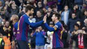 Una foto de Gerard Piqué y Leo Messi celebrando uno de los goles ante el Espanyol / FCB
