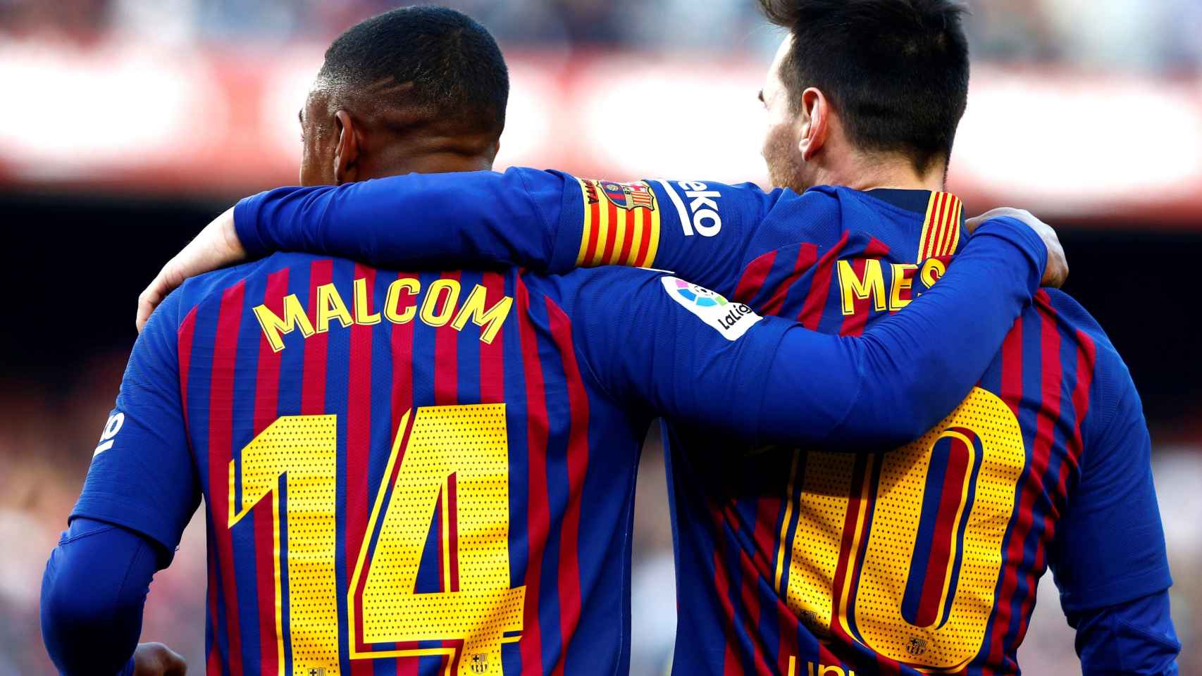 Malcom y Leo Messi celebrando un gol con el Barça frente al Espanyol / EFE