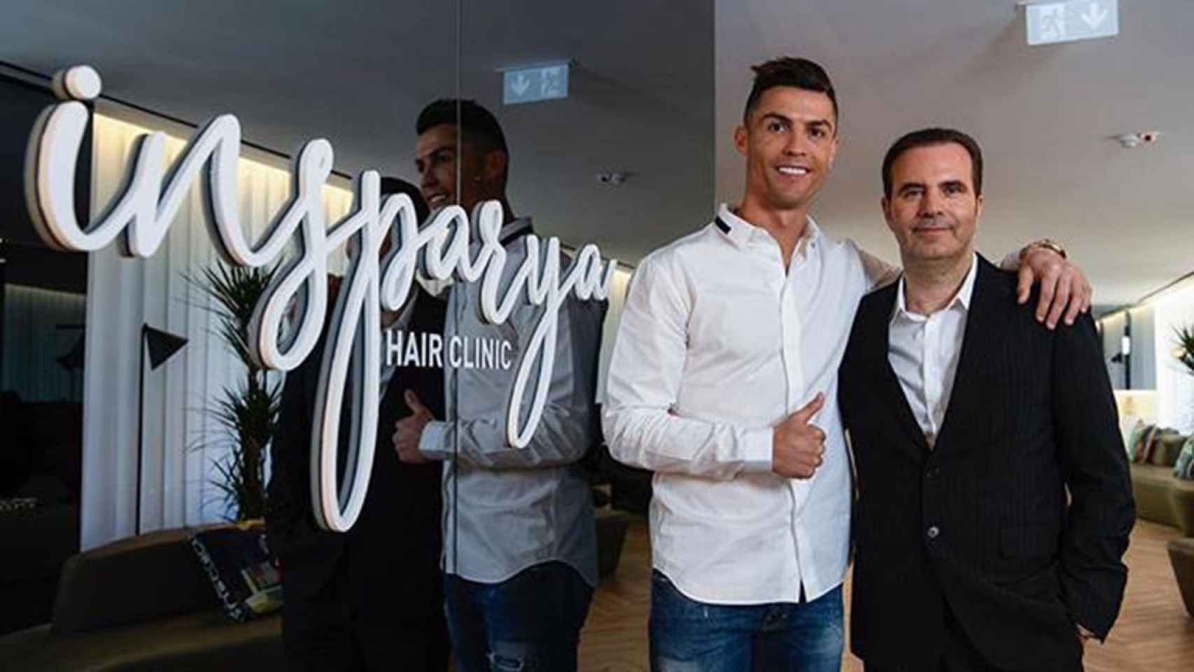 Cristiano Ronaldo y Paulo Ramos presentando su clínica capilar en Madrid / EFE