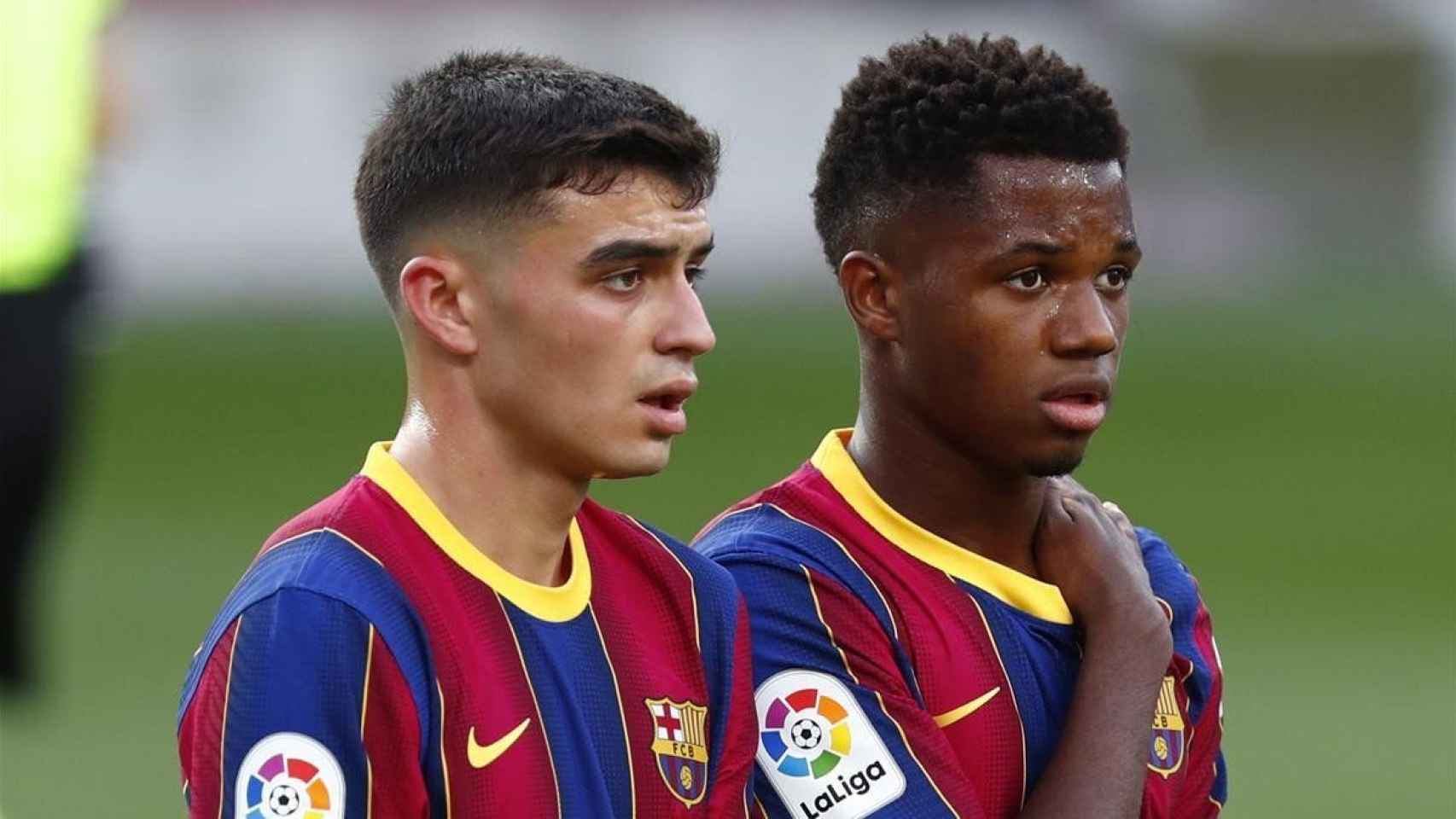 Pedri y Ansu Fati, que podrían negociar con otros equipos en 2022, en un partido con el Barça | EFE