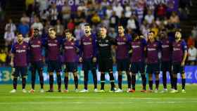 Los jugadores del Barça, durante un minuto de silencio | EFE
