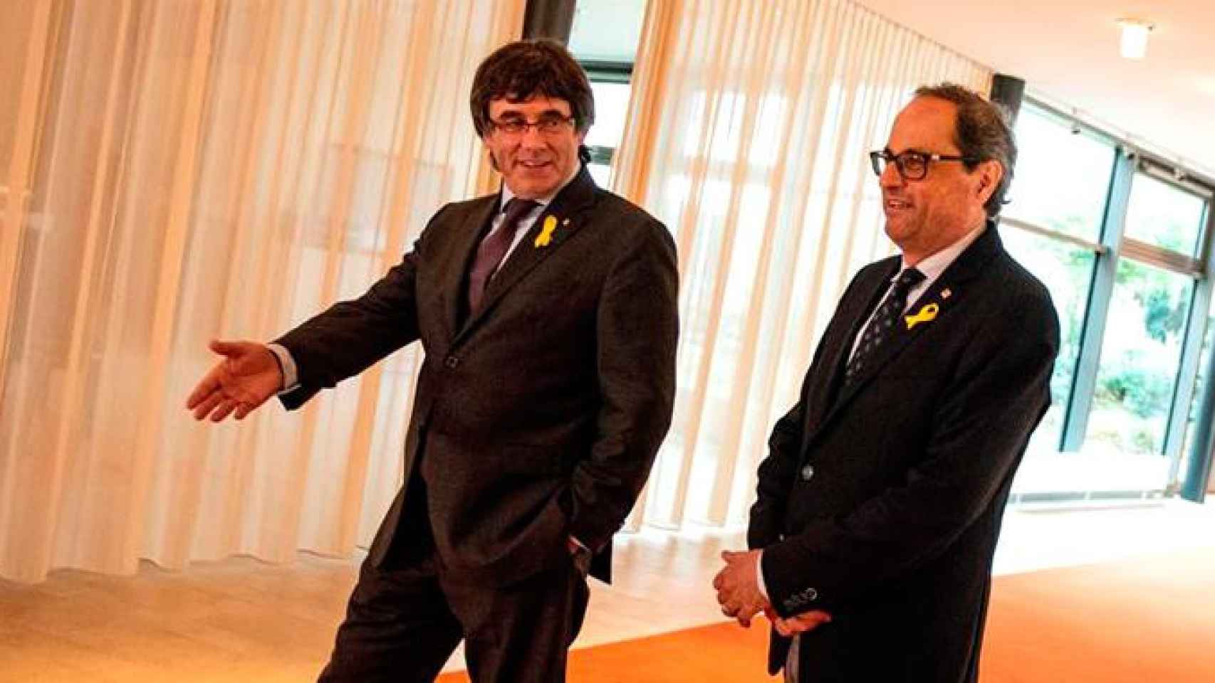 El líder de JxCat, Carles Puigdemont (i), y el presidente de la Generalitat, Quim Torra (d), en su encuentro en Berlín / EFE