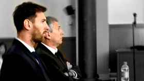 Leo Messi y su padre en la Audiencia Nacional declarando a principios de junio.