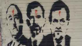Grafiti del colectivo Arran en Sant Cugat amenazando a Felipe VI y a Rajoy