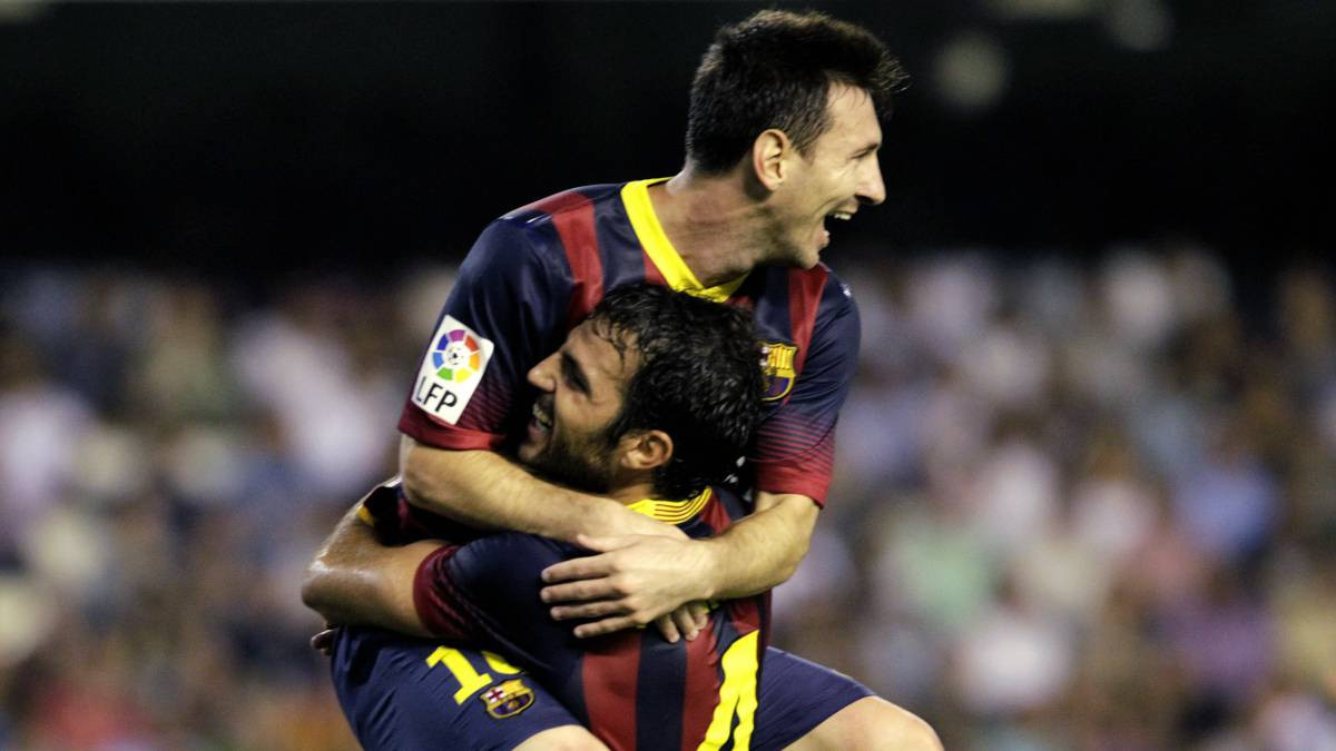 Cesc Fàbregas y Messi celebran un gol con el Barça / EFE