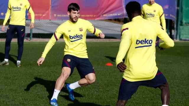 Carles Pérez en un entrenamiento con Moussa Wagué / FC Barcelona