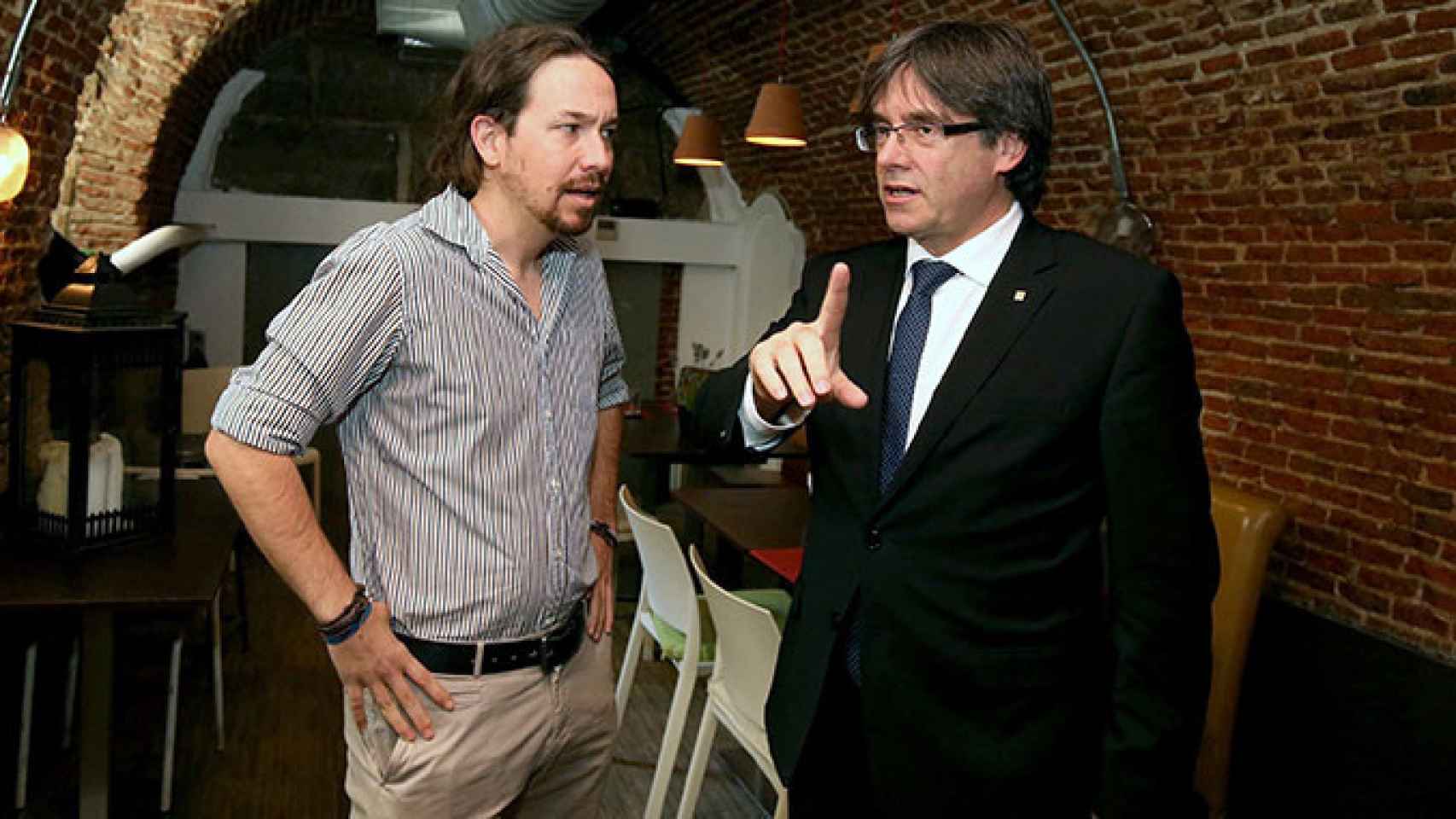 El líder de Podemos, Pablo Iglesias, junto al presidente de la Generalitat, Carles Puigdemont / EFE