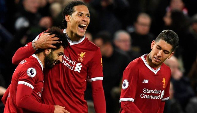 Salah, Van Dijk y Firmino celebrando un gol con el Liverpool / EFE