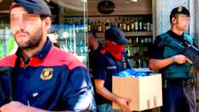 Agentes de la policia sacando infomación de un restaurante acusado de reciclar dinero de la Camorra en Barcelona