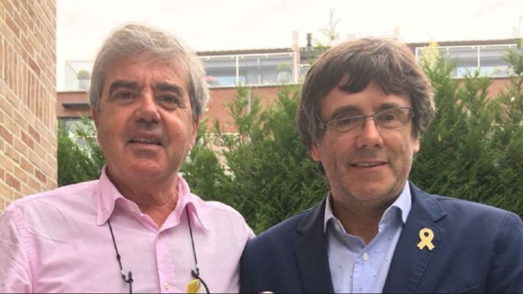 Gorka Knörr junto al expresidente de la Generalitat Carles Puigdemont / EFE