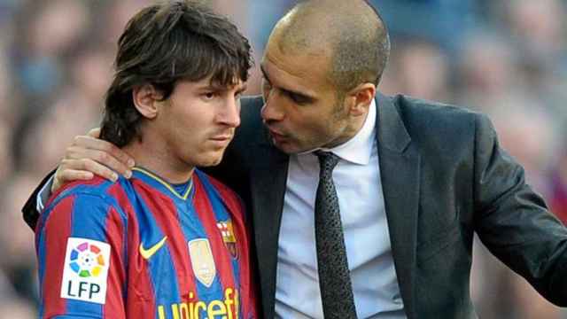 Pep Guardiola con Messi / EFE