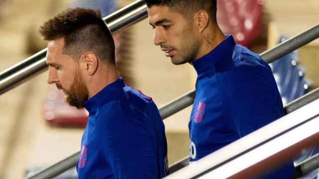 Luis Suárez con Leo Messi en un entrenamiento / EFE