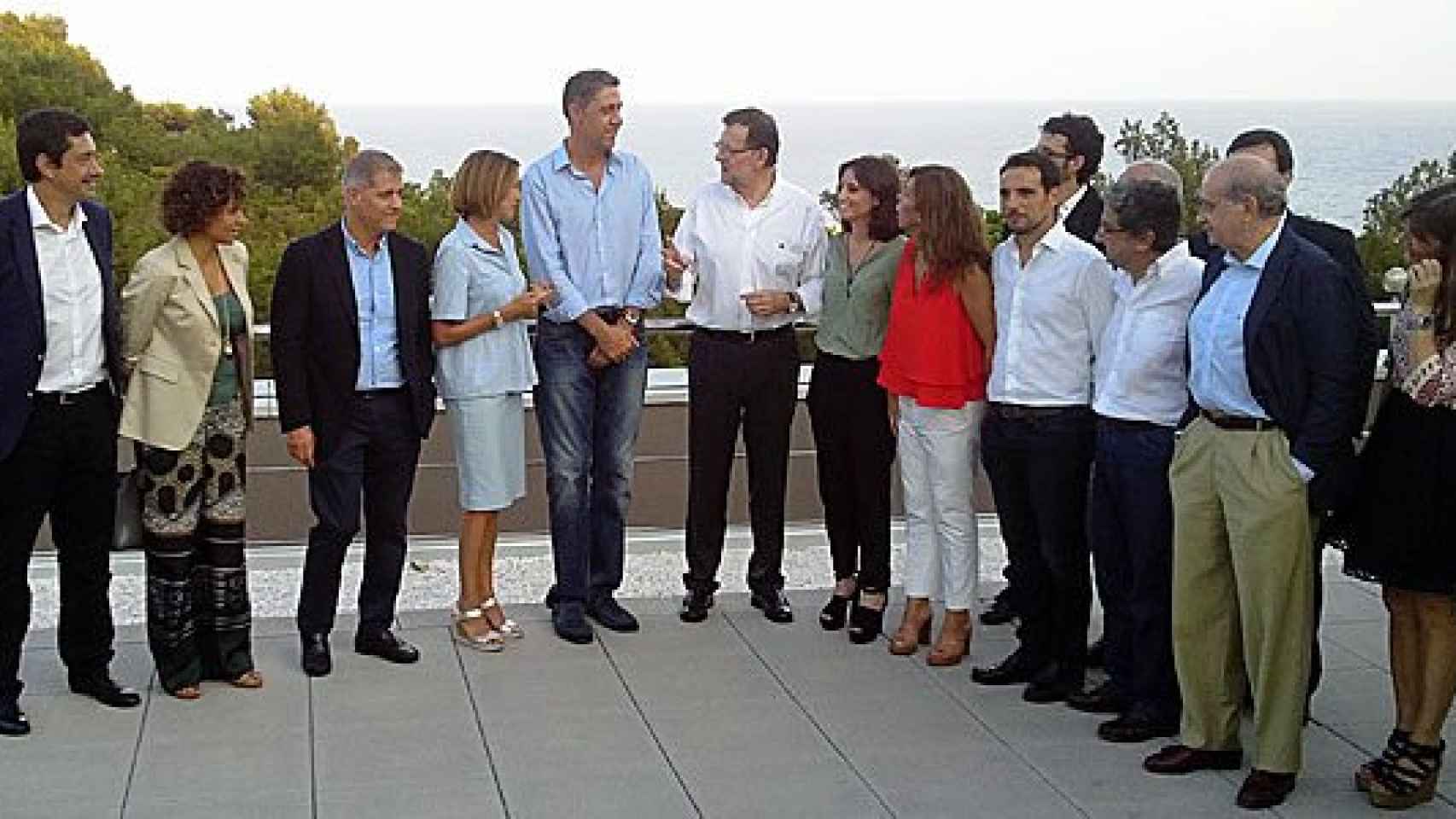 Rajoy, rodeado de dirigentes del PP, durante la presentación de García Albiol como candidato el partido al 27S
