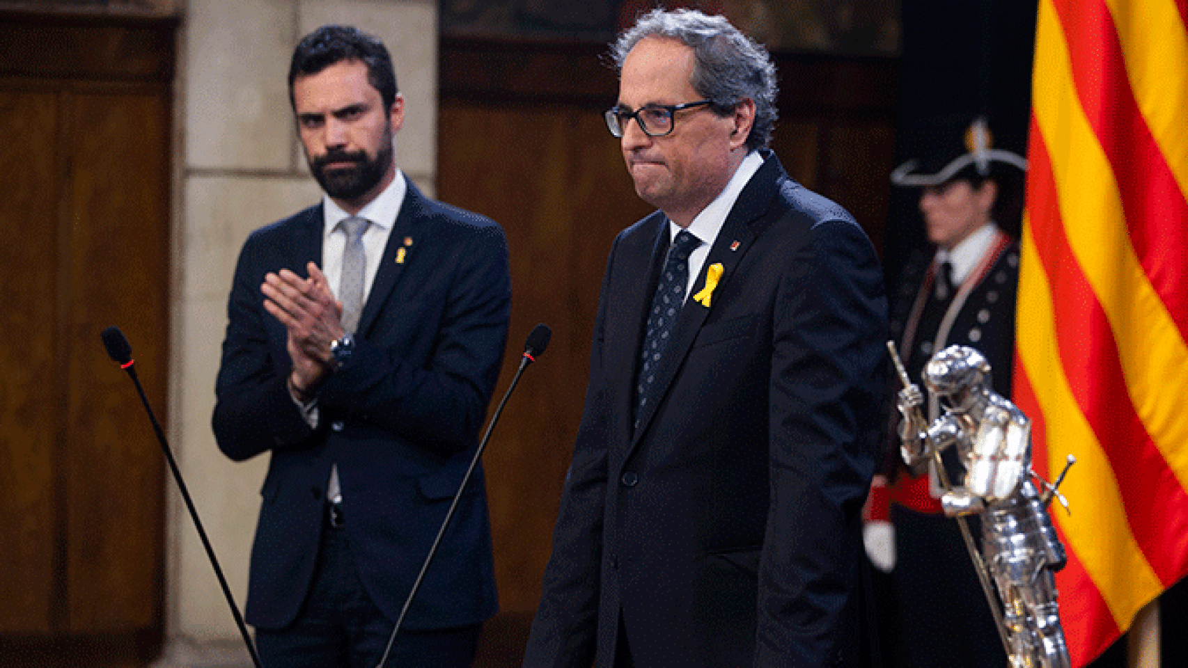 El presidente del Parlament y dirigente de ERC Roger Torrent, y el de la Generalitat, Quim Torra, durante la toma de posesión de los 'consellers' / EFE