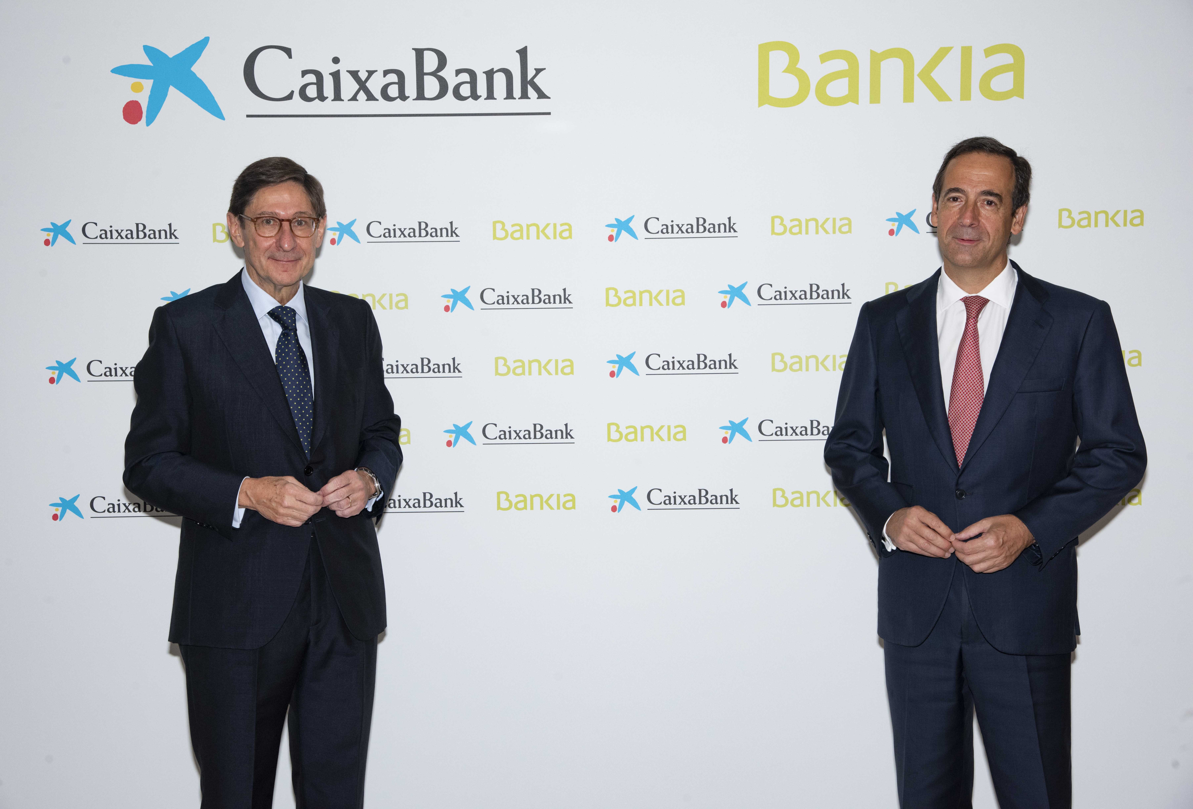 El presidente de Bankia y que será presidente ejecutivo de la nueva entidad, José Ignacio Goirigolzarri (i), y el consejero delegado de CaixaBank y que será consejero delegado de la nueva entidad / EP