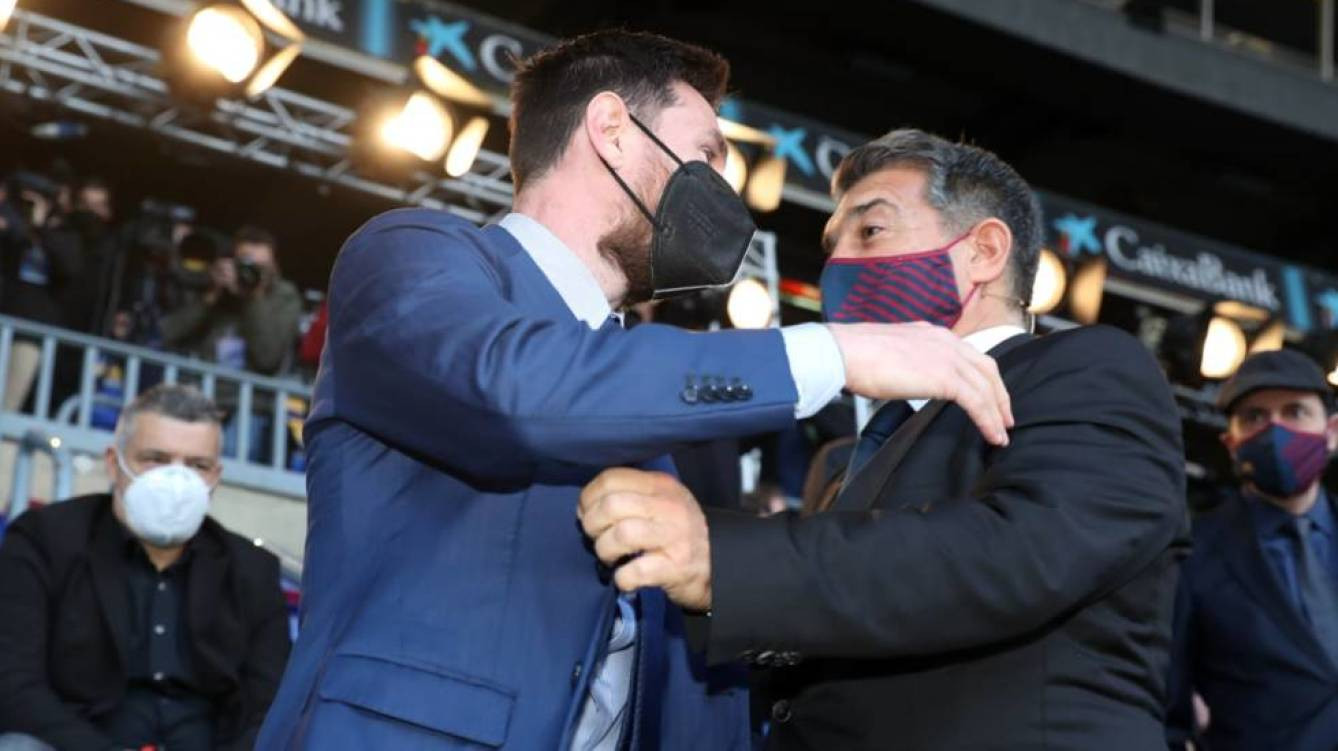 Leo Messi con Joan Laporta / EFE
