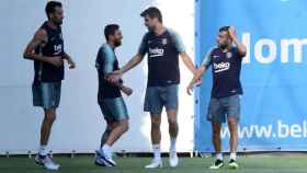 Sergio Busquets, Leo Messi, Gerard Piqué y Jordi Alba en un entrenamiento / FC Barcelona