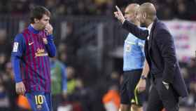 Una foto de archivo de Pep Guardiola y Leo Messi en el Barça / EFE