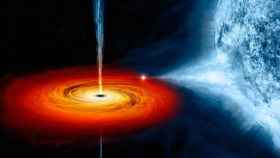 Representación de un agujero negro en el universo / NASA