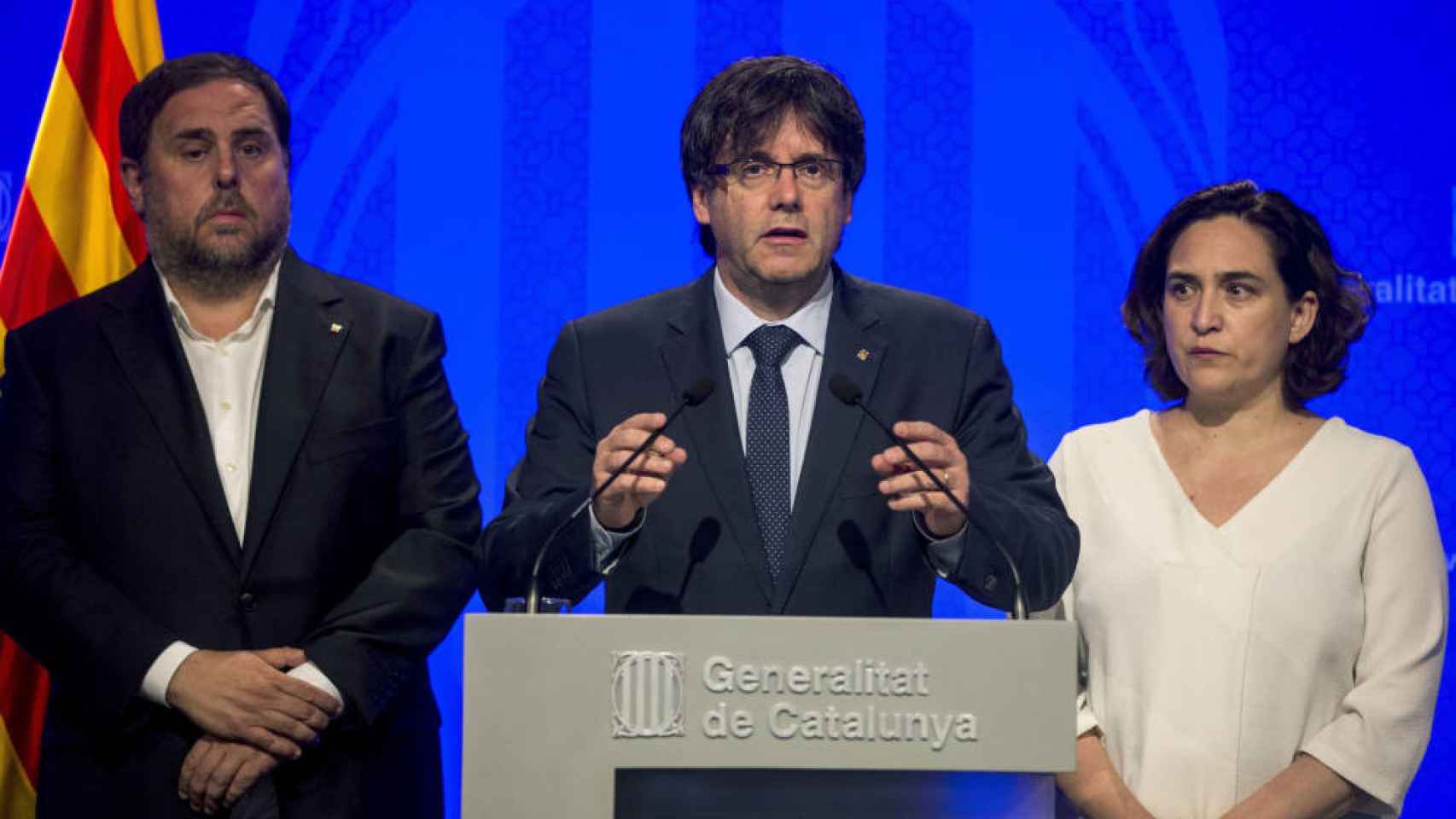 Ada Colau, Carles Puigdemont y Oriol Junqueras en una imagen de archivo / EFE