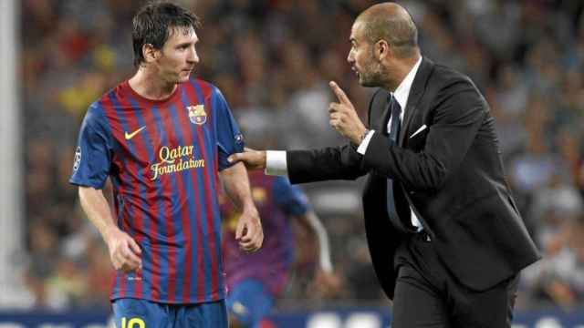 Guardiola, con Messi en su etapa en el Barça | EFE