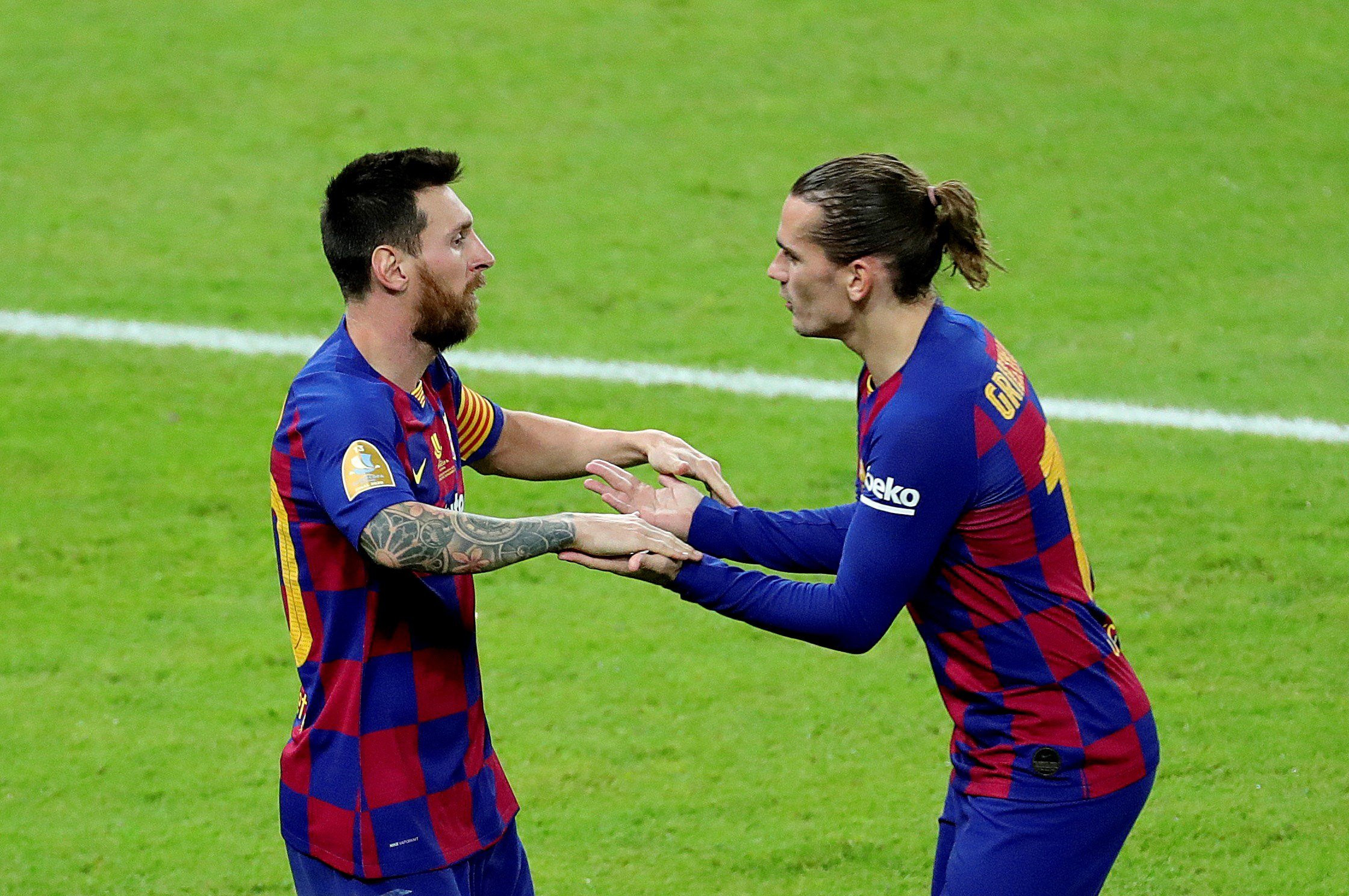 Messi y Griezmann celebrando un gol con Messi / EFE