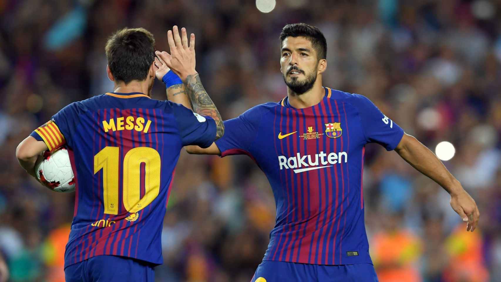 Leo Messi y Luis Suárez celebrando un gol del Barça / EFE
