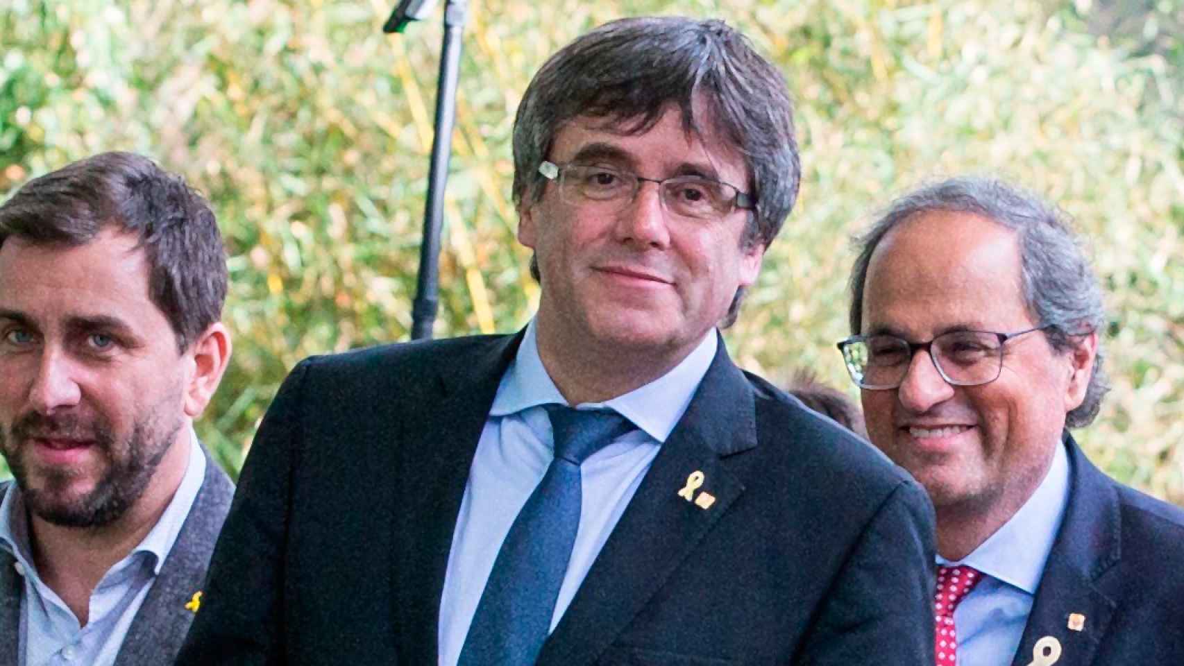 El presidente de la Generalitat, Quim Torra (d), el expresidente catalán Carles Puigdemont (c), y el exconseller de ERC huido a Bélgica Toni Comín / EFE