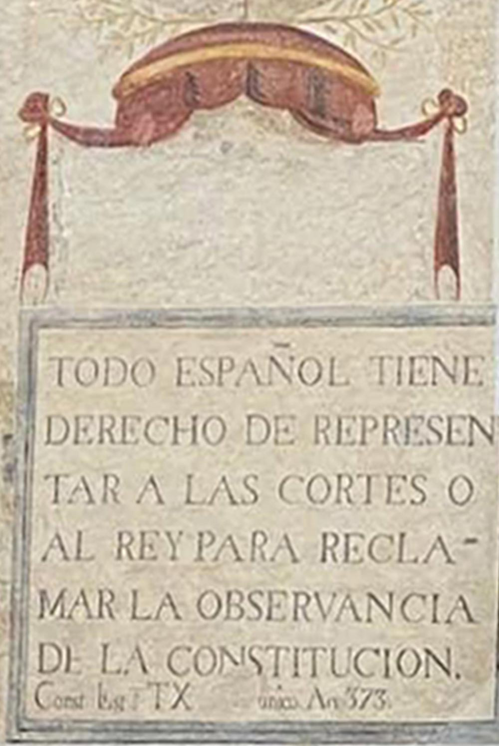 Imagen del grabado escondido bajo una sábana en la fachada del Ayuntamiento de Arenys de Mar
