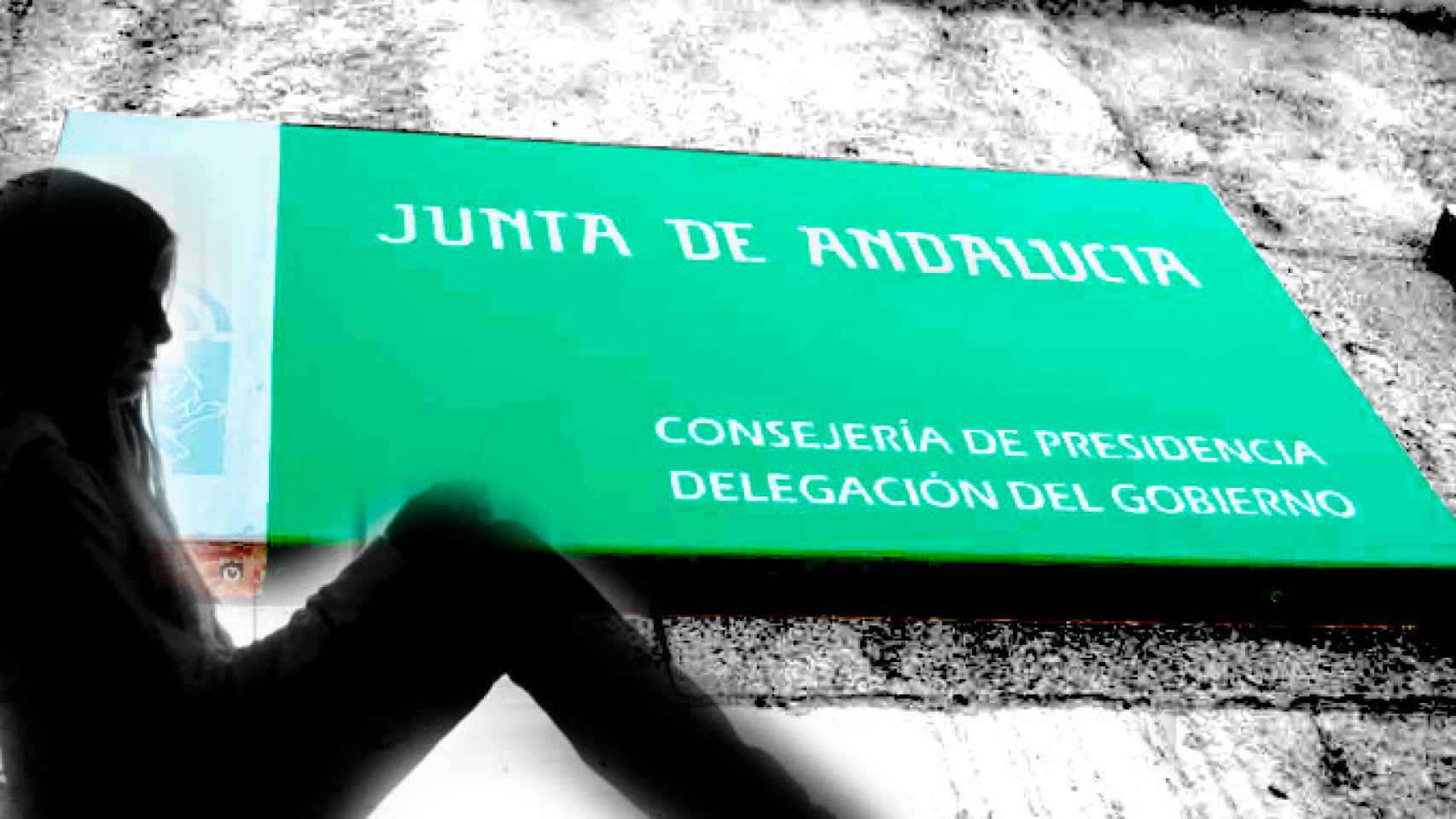 Joven delante del edificio de la Junta de Andalucia / FOTOMONTAJE DE CG