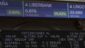 Los paneles de la Bolsa de Madrid cuando las acciones de Liberbank subían casi un 29% / EFE
